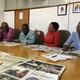 Reporters and editors plan the daily coverage of the Zimbabwe Herald. The state-owned newspaper was forced this month to cover the downfall of Robert Mugabe, whose rule it had long applauded. (Kevin Sieff/Washington Post)